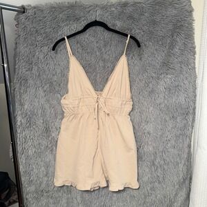 SHEIN Beige Lace Trim Spaghetti Strap Smocked Waist Ruffle Hem Romper Shorts